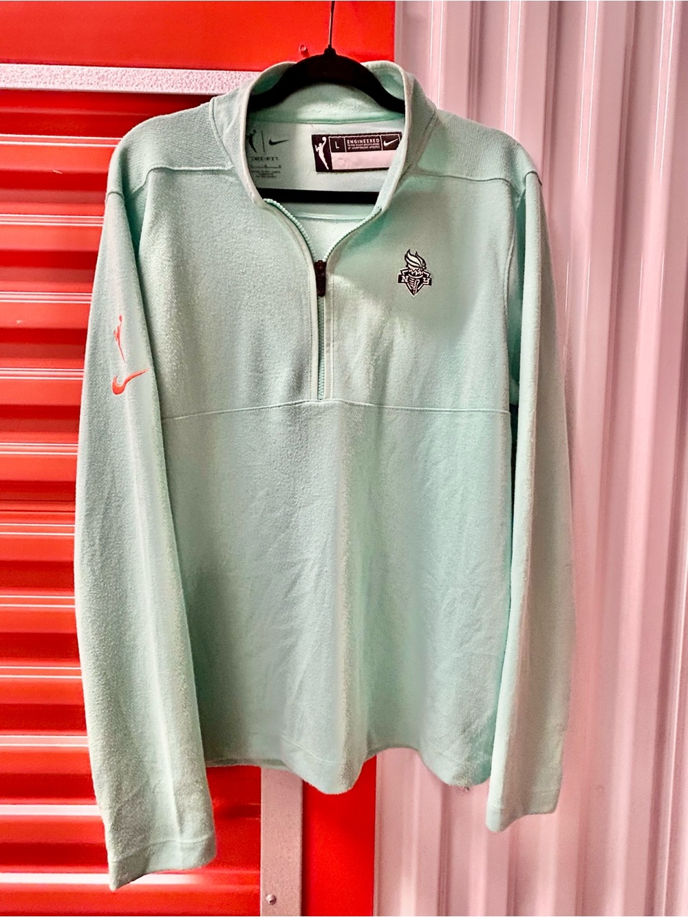 Nike WNBA New York Liberty Women's Basketball Fleece Quarter-Zip Pro Pullover.